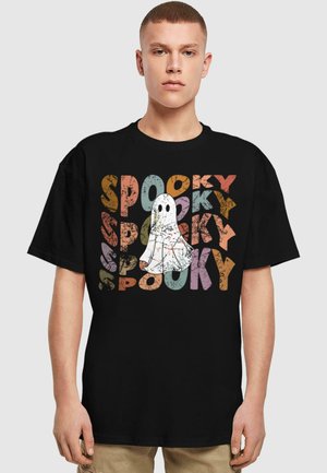 Black cotton t-shirt featuring colorful "SPOOKY" text and a cartoon ghost graphic in the center. Short sleeves and relaxed fit.