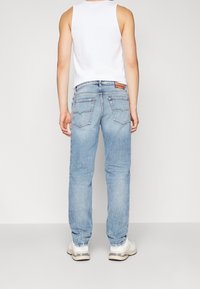 Diesel Jeans Tapered Fit - blue denim