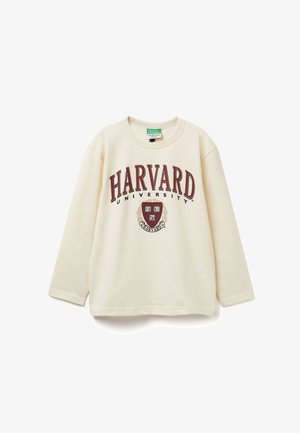 Felpa a maniche lunghe crema con la scritta "HARVARD UNIVERSITY" in bordeaux, accompagnata dal logo a scudo. Realizzata in cotone morbido; design a vestibilità rilassata.