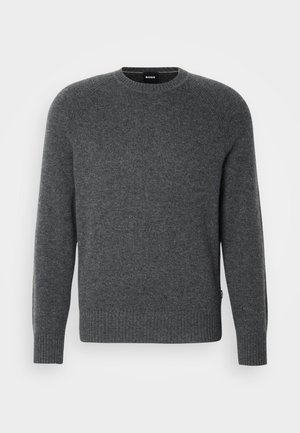Gray knitted sweater with a round neckline, ribbed cuffs, and hem, made from soft material; features a small brand label on the side.