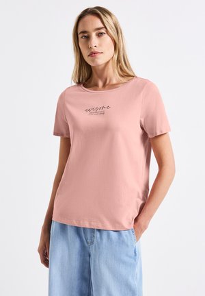T-shirt rose clair à manches courtes avec un col rond et un texte en cursive noir "awesome" sur la poitrine. Matière en coton doux avec une coupe décontractée.