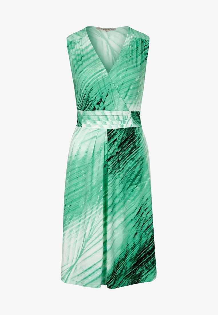 Robe verte sans manches, longueur genou, avec un motif de feuilles abstraites et une taille cintrée.