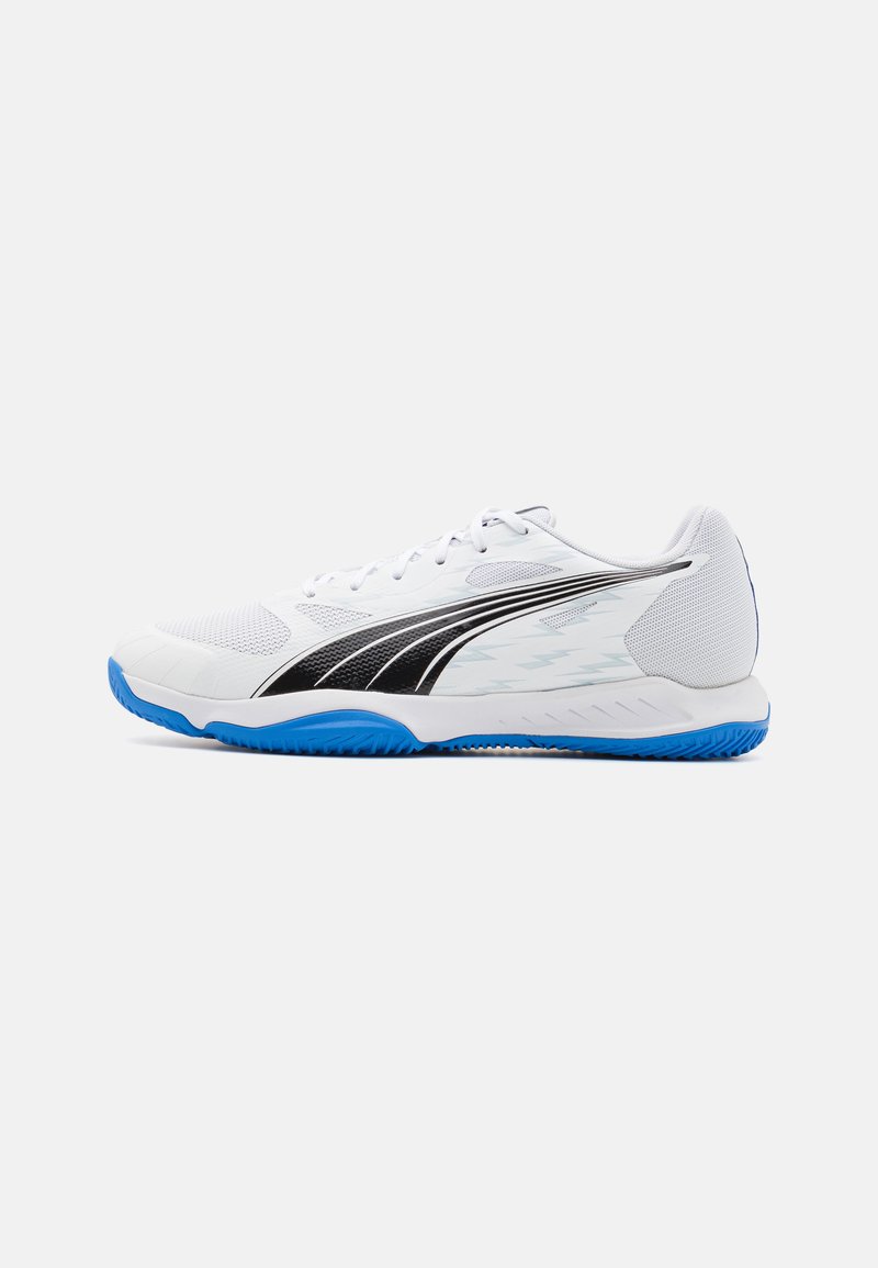 White athletic shoes with a breathable mesh upper, black accents, a textured, light blue rubber sole, and lace-up design for secure fit.