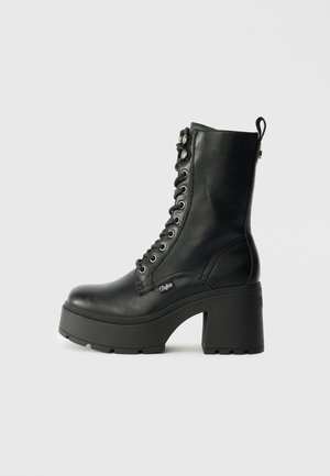 Buffalo MILA MID - Lace-up ankle boots - black