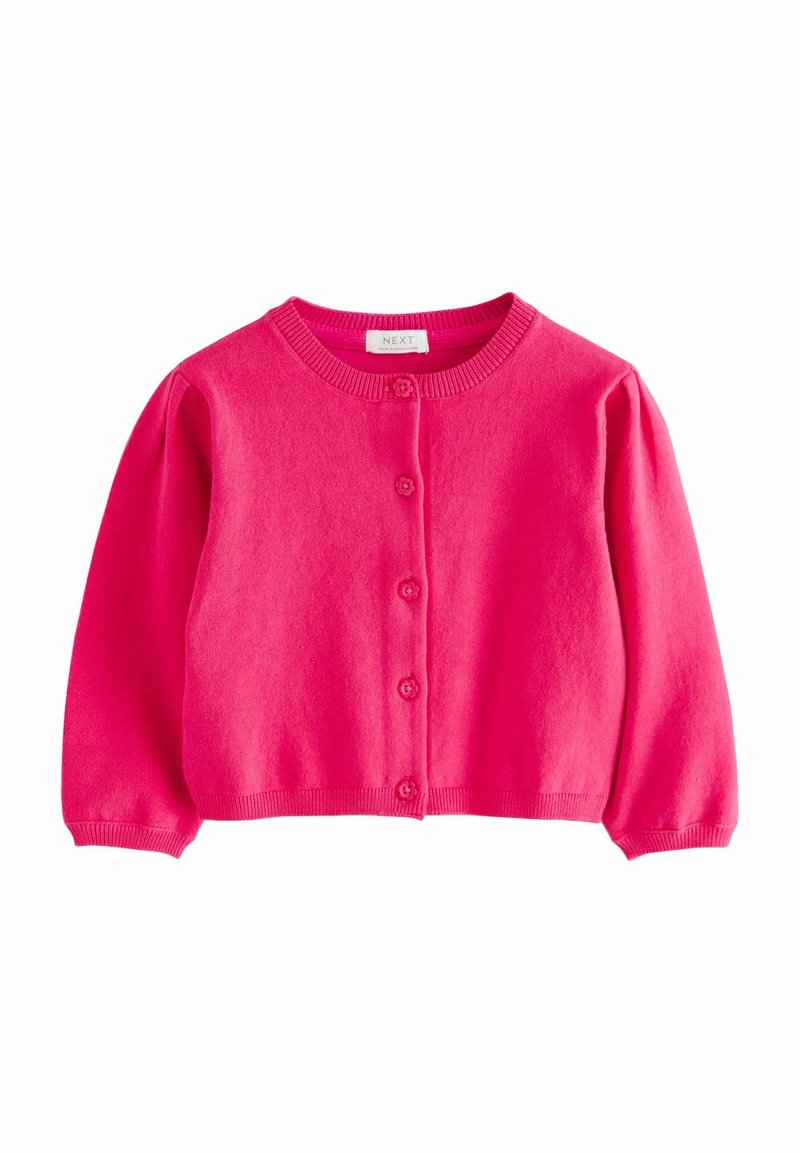 Cardigan tricoté rose vif à manches longues avec encolure ronde et cinq boutons en forme de fleurs sur le devant.