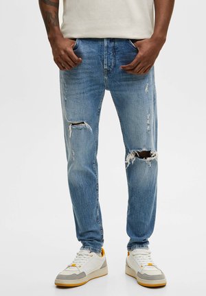 CARROT WITH RIPPED LEGS - Jeans Tapered Fit - light-blue denim