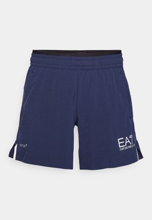 Mörkblå träningsshorts med elastisk midja, sidofickor och vita logodetaljer. Tillverkade av lätt, andningsbart material.