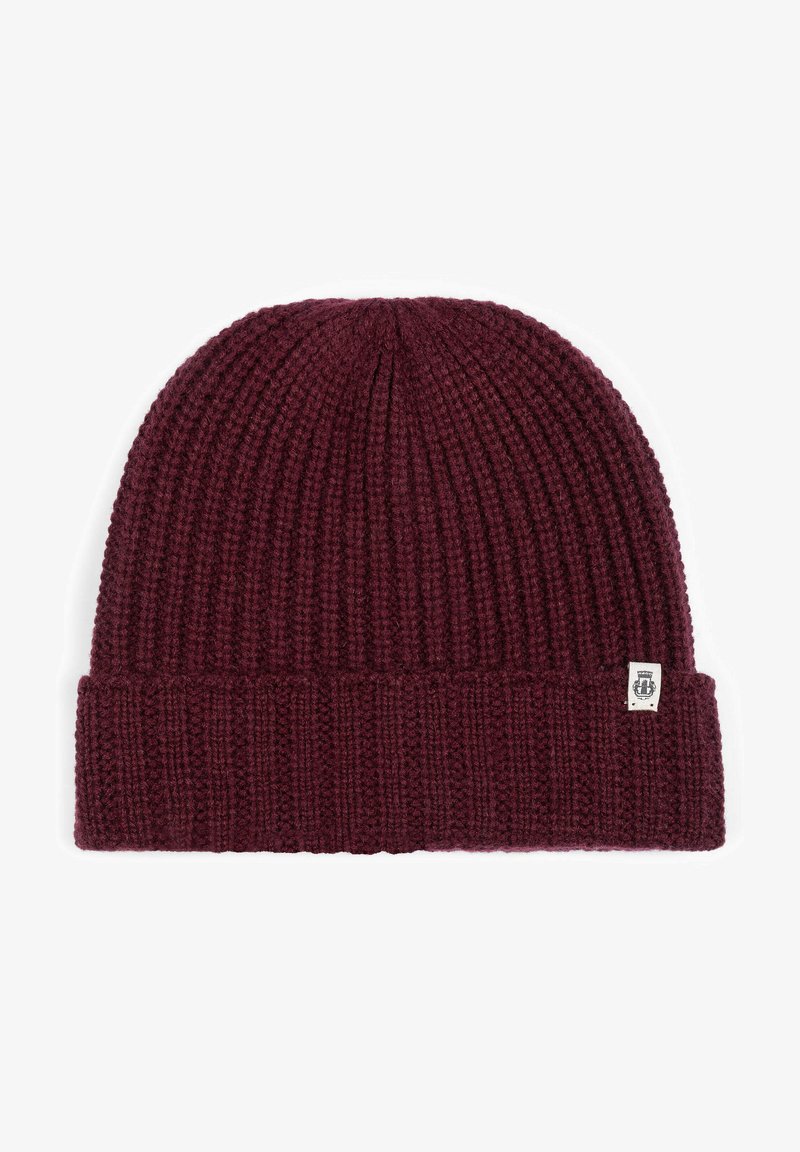 Knit beanie in deep burgundy, featuring a ribbed texture and a folded cuff. Includes a small white logo tag on the side.