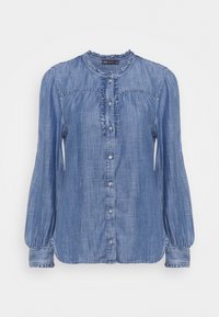 Camicia in denim a bottoni, di colore azzurro chiaro, maniche lunghe con spalle a palloncino, patta frontale arricciata e texture liscia. Orlo arrotondato e bottoni argentati.