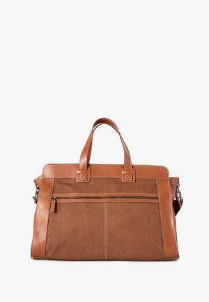 Bruine stoffen en leren handtas met twee handgrepen en een voorvak met rits, ontworpen om persoonlijke items te dragen.