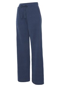 Marineblauwe geribde loungebroek van zachte stof, met een elastische tailleband en een trekkoord voor een verstelbare pasvorm. Losse pasvorm.