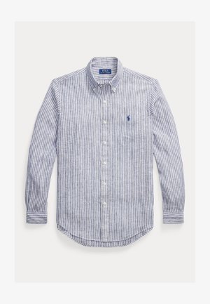 Sinine ja valge vertikaalsete triipudega pika varrukaga särgike, nööpidega kinnitatav krae ja vasakul rinnal väike tikitud logo