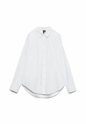 Witte blouse met een klassieke kraag, lange mouwen, een gebogen zoom en kleine zwarte stippenaccenten door de stof.