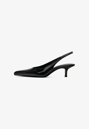 Black pointed-toe slingback shoe with a glossy leather finish and a thin, low heel. Features a cutout on the side for breathability.