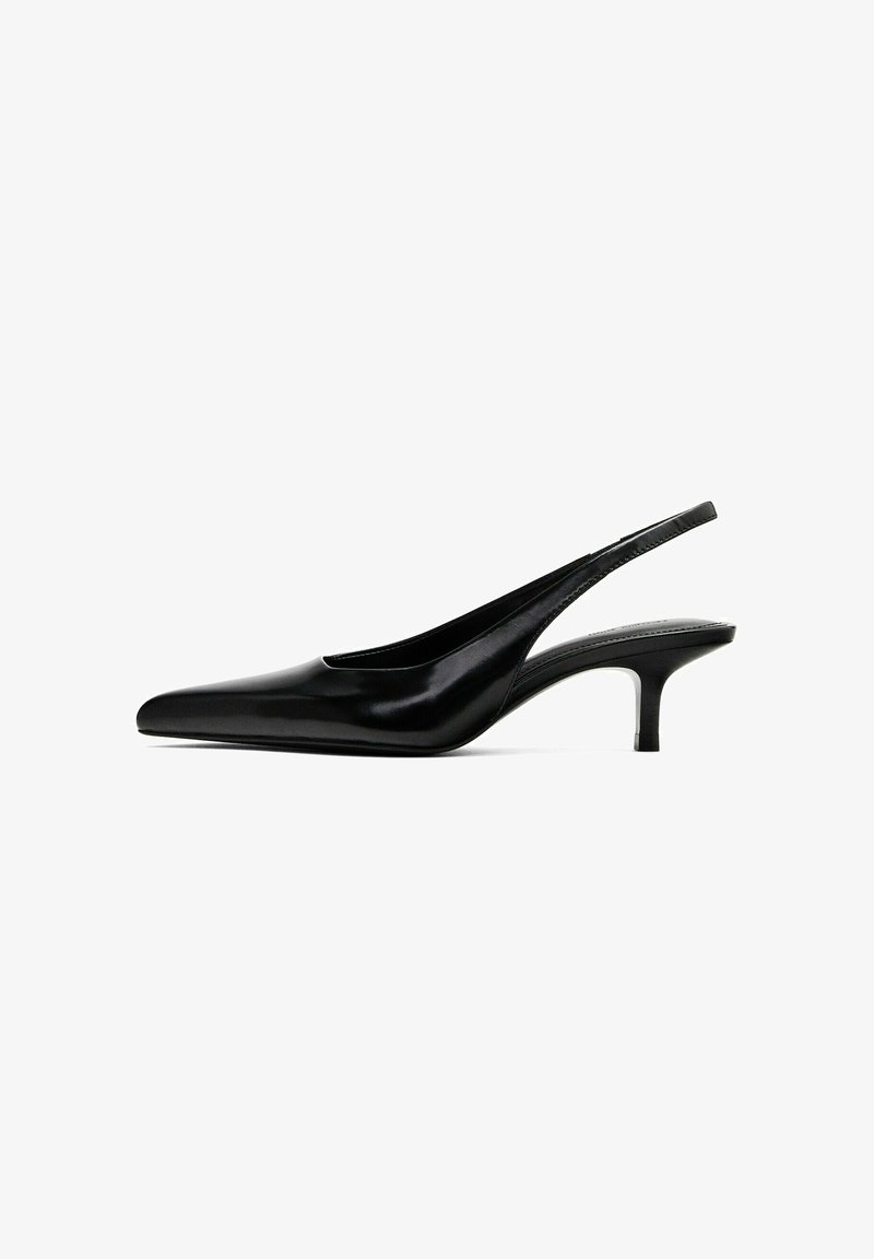 Black pointed-toe slingback shoe with a glossy leather finish and a thin, low heel. Features a cutout on the side for breathability.
