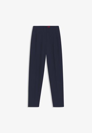 Pantaloni su misura blu navy con una texture liscia, dotati di pieghe frontali e tasche laterali. Design a gamba dritta e senza decorazioni visibili.