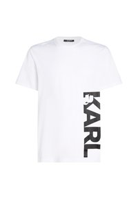 T-shirt en coton blanc avec un grand logo noir imprimé "KARL" sur le côté gauche, manches courtes et encolure classique.