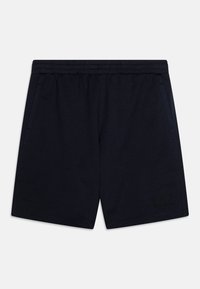 Shorts bleu marine en mélange de coton, dotés d'une taille élastique, de poches latérales et d'un logo discret sur le bas à gauche.