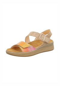 Beige Sandale mit einem strukturierten, mehrfarbigen, gewebten Riemen in Orange und Pink, verstellbarem Knöchelriemen und einer leichten, gepolsterten Sohle.