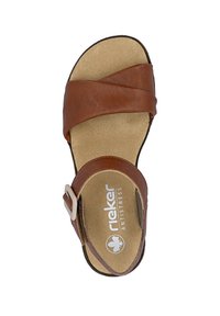 Brown leather open-toe sandal with adjustable ankle buckle and cushioned beige insole labeled "rieker ANTISTRESS."