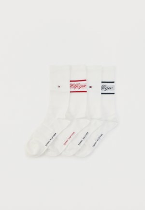 Balti kokvilnas potītes zeķes trīs iepakojumā, ar sarkaniem, rozā un tumši ziliem svītrām. Katram zeķim pie aproces ir uzdrukāts "Tommy Hilfiger" logotips.