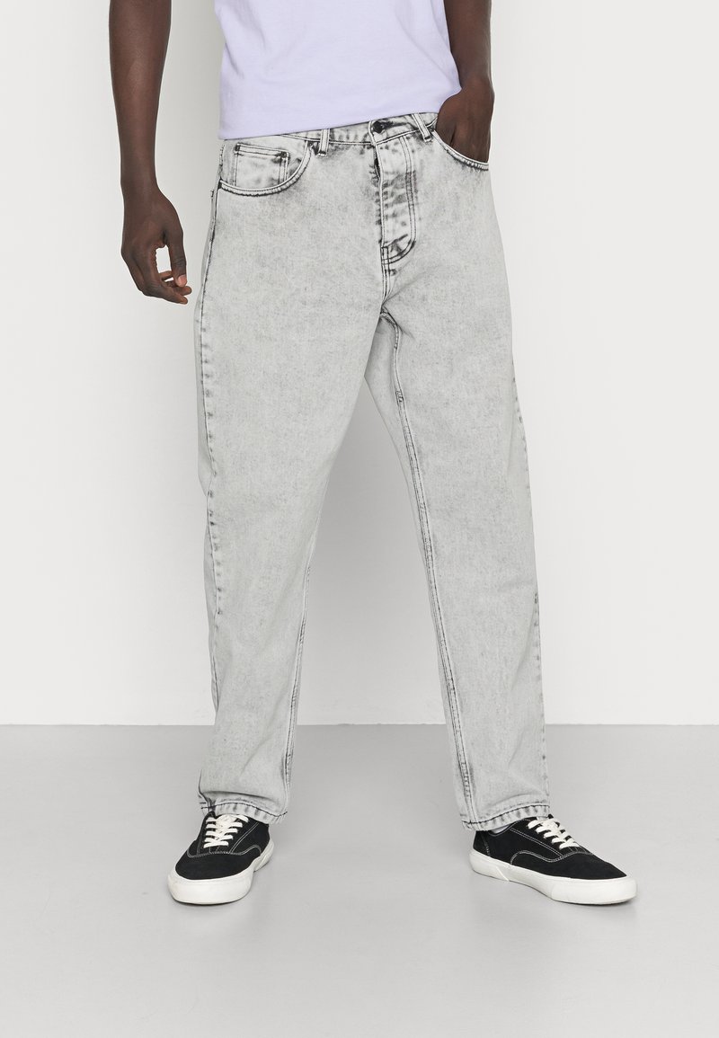 Carhartt WIP NEWEL PANT - Calças de ganga de corte afunilado - black sun washed