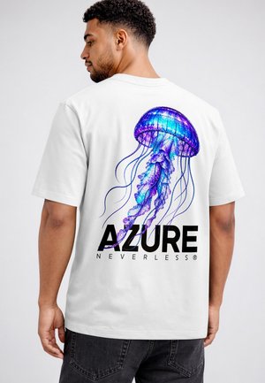 Man wearing a white t-shirt with a blue and purple jellyfish graphic and the words "AZURE NEVERLESS" on the back.