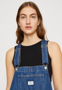 Levi's® VINTAGE DENIM OVERALLS - Tuinbroek - blue denim/blauw denim/bluedenim