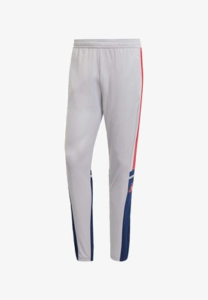 Gray athletic pants featuring red side stripes, a navy panel on the lower sides, and an elastic waistband for a secure fit.