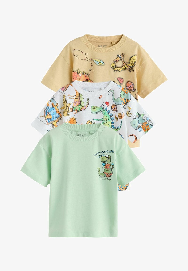 Trois t-shirts à manches courtes pour enfants en beige, blanc et vert clair, chacun orné d'imprimés et de motifs colorés sur le thème des dinosaures.