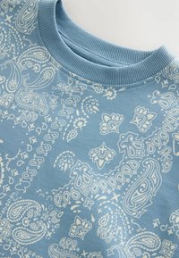 Next Triko s potiskem - blue white