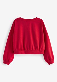 Rød cropped sweatshirt med rund halsudskæring, lange puf-ærmer og elastisk kant. Blødt, struktureret stof i en ensfarvet farve.