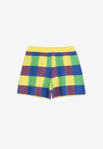 Boxers en tricot avec une taille jaune et un motif à carreaux colorés en bleu, vert, rouge et jaune. Texture douce avec des ouvertures sur les côtés.