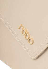 Nobo Olkalaukku - beżowy