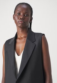 DRYKORN FLECKNOE - Weste - black