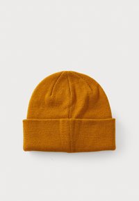 Mustard yellow knit beanie hat with a folded cuff. Soft texture, rounded top, and visible stitching on the brim and crown.