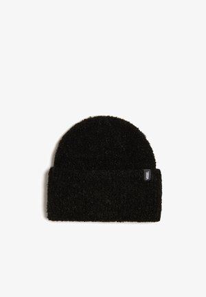 Beanie nera realizzata in un morbido e soffice tessuto. Presenta un risvolto e una piccola etichetta con logo sul lato. Forma rotonda e strutturata.