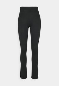 Leggings pretas com textura canelada, cintura alta, fundo flare e textura suave. Sem padrões visíveis ou detalhes de hardware.
