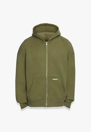 Olíva zöld, cipzáros kapucnis felső, puha anyagból készült, elülső cipzárral, két oldalsó zsebbel és bordás mandzsettákkal és aljjal.