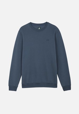 Navy blue long-sleeve crewneck sweatshirt with ribbed cuffs and hem, featuring a small embroidered elephant logo on the left chest.