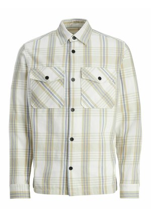 Chemise en flanelle à carreaux blanche, jaune et bleu clair. Avec des boutons noirs, deux poches poitrine et un col classique. Tissu texturé.