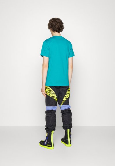 MOSCHINO T-shirt estampada - turquoise