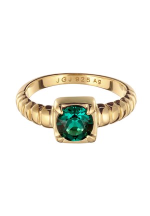 Bague en or avec bande rainurée et sertissage carré tenant une pierre précieuse ronde, facettée, de couleur vert foncé. Intérieur gravé "JGJ 925 Ag".