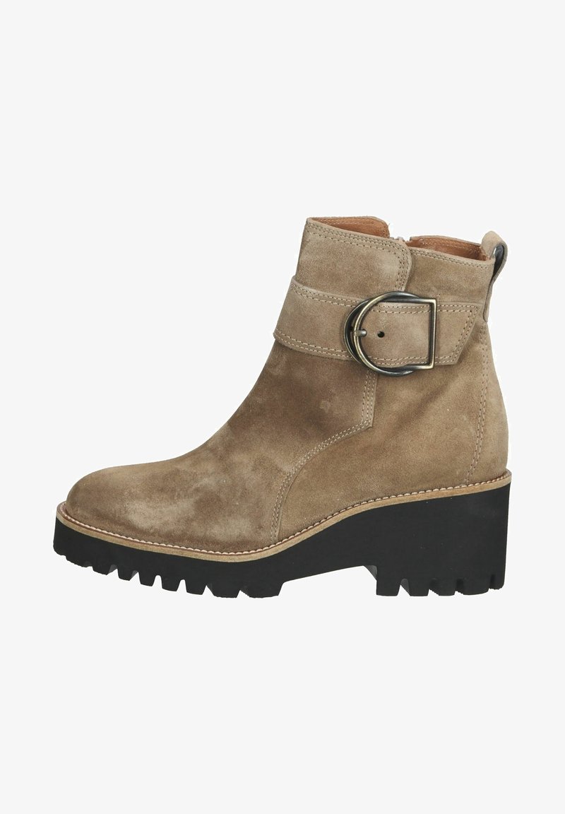 Taupe suede ankle boot with a wide strap and metal buckle detail. Features a textured black platform sole with a ridged edge.