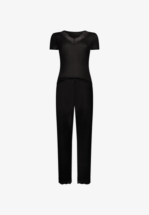 Combinaison noire dotée de manches courtes, d'un décolleté en V orné de dentelle, de jambes effilées et d'accents en dentelle aux chevilles. Fabriquée en tissu lisse.