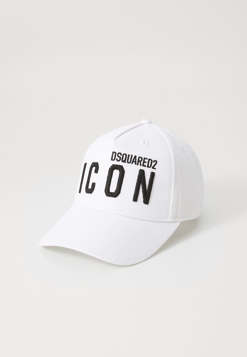 White baseball cap featuring black embroidered text "ICON" and "DSQUARED2" on the front. Made of cotton with a structured design.