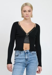 INFLUENCER FRILLED - Gilet - black