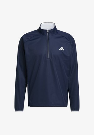 Pull-over de sport bleu marine à manches longues avec un col à fermeture éclair blanche sur un quart et un petit logo Adidas blanc sur la poitrine gauche.