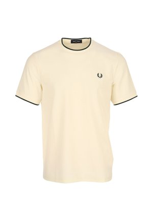 Crèmekleurig T-shirt met korte mouwen, donkergroen accent rondom de hals en mouwen, met een klein logo op de linkerborst.