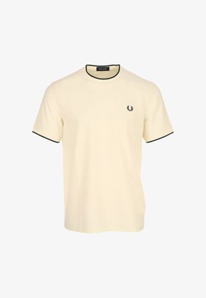 Crèmekleurig T-shirt met korte mouwen, donkergroen accent rondom de hals en mouwen, met een klein logo op de linkerborst.